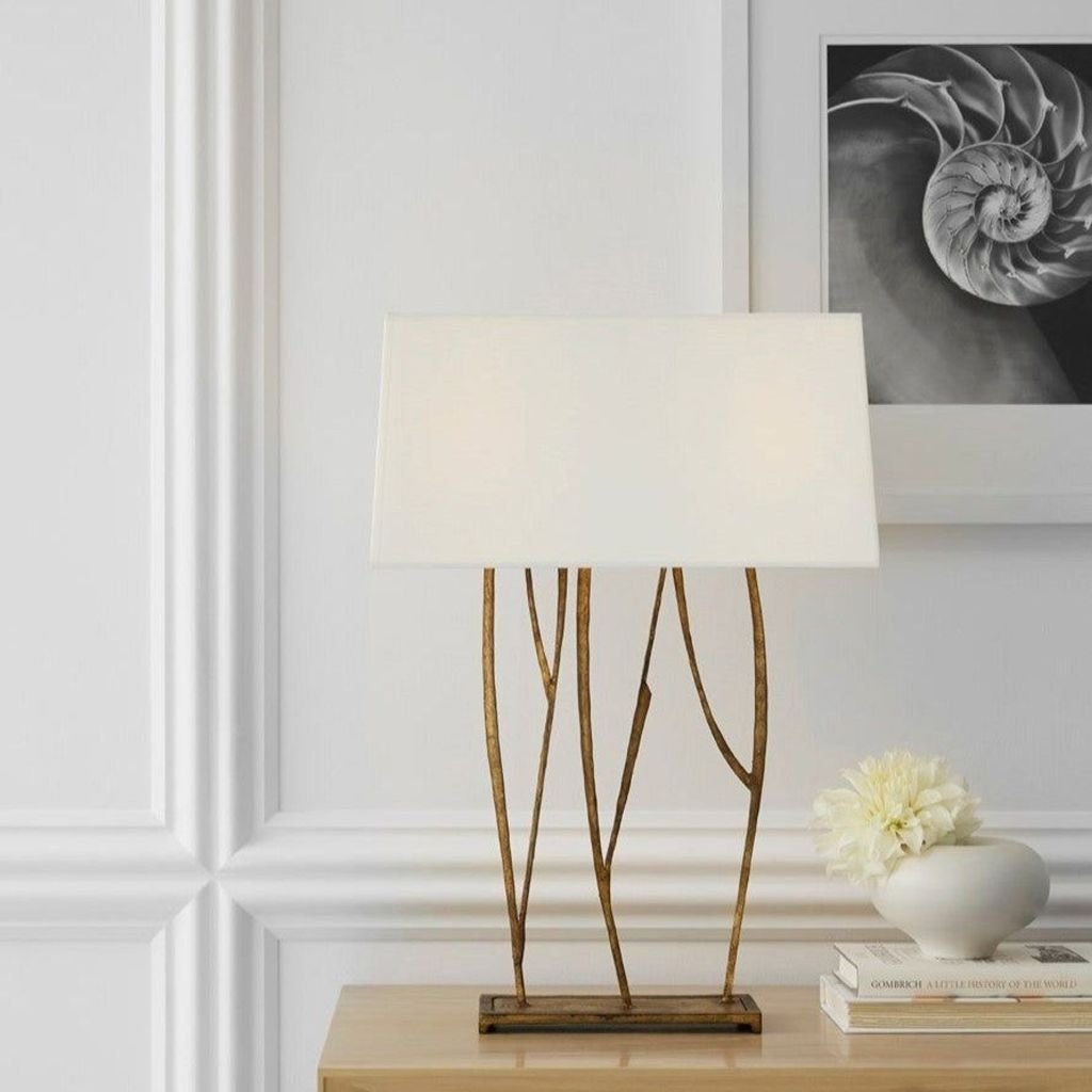 Aspen console lamp Elegant luxury furniture table with unique wooden base and white lampshade, perfect for sophisticated interiors.